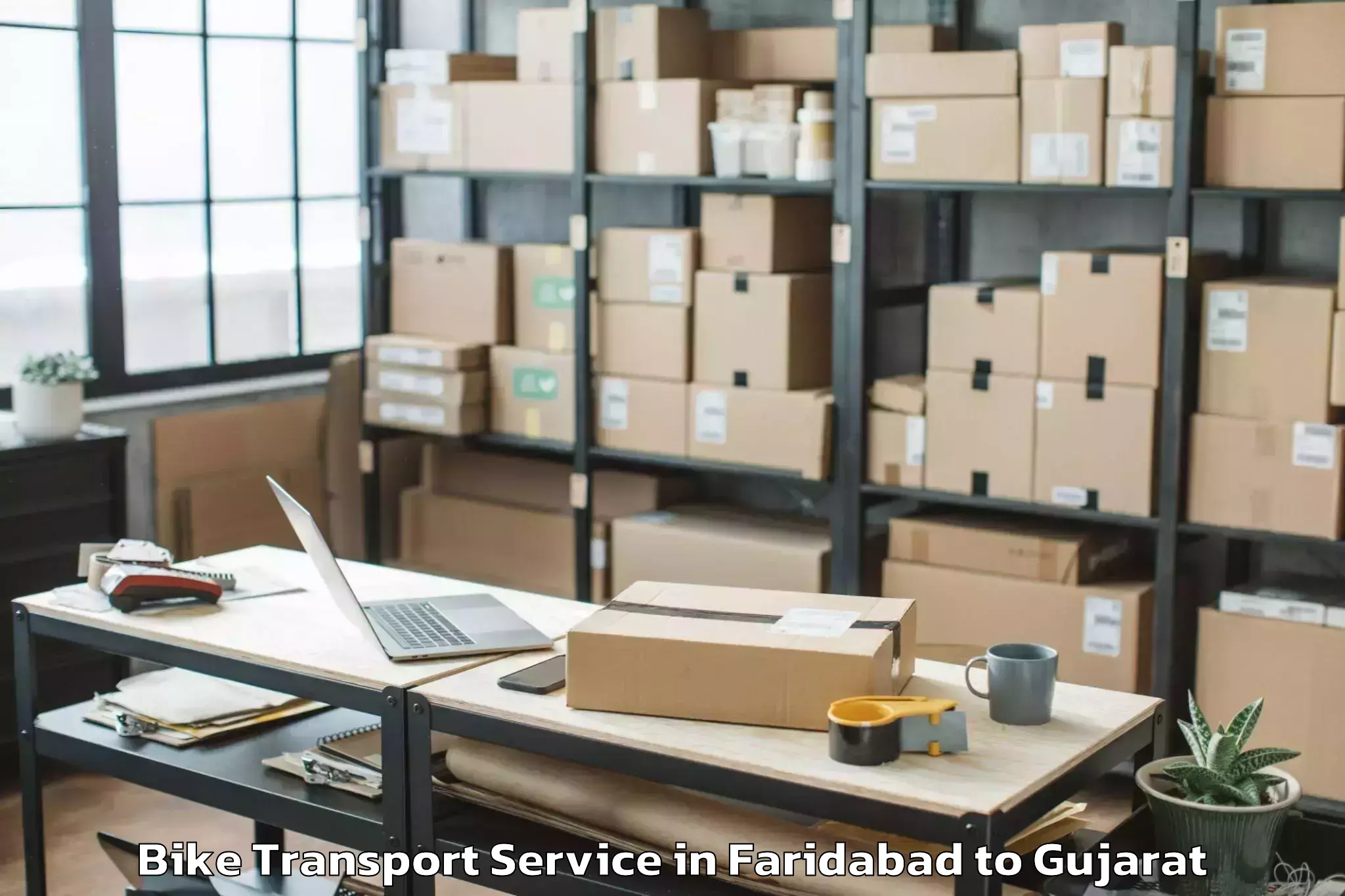 Professional Faridabad to Surat Airport Stv Bike Transport